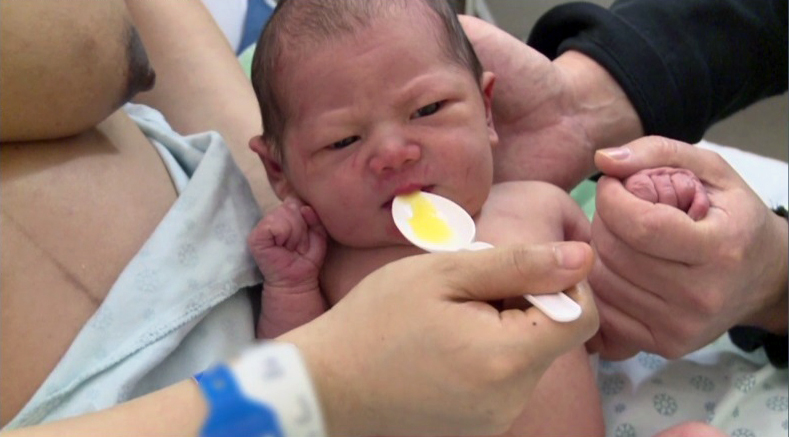 Spoon-feeding- cropped from video.jpg